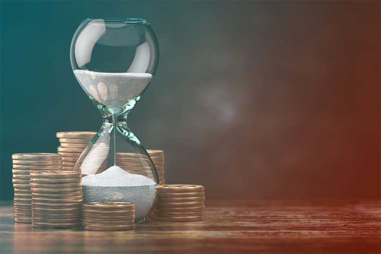 Image of coins and a time glass